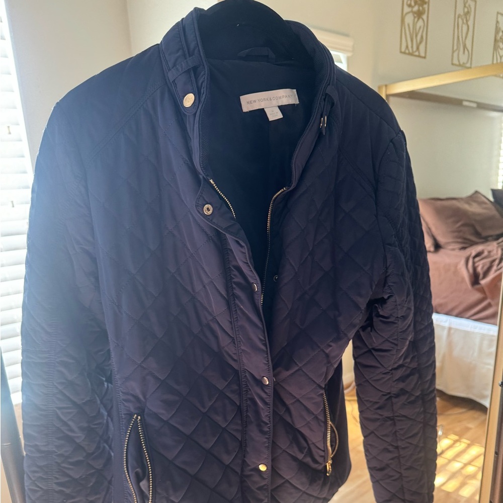 Navy Blue bomber jacket in excellent condition.